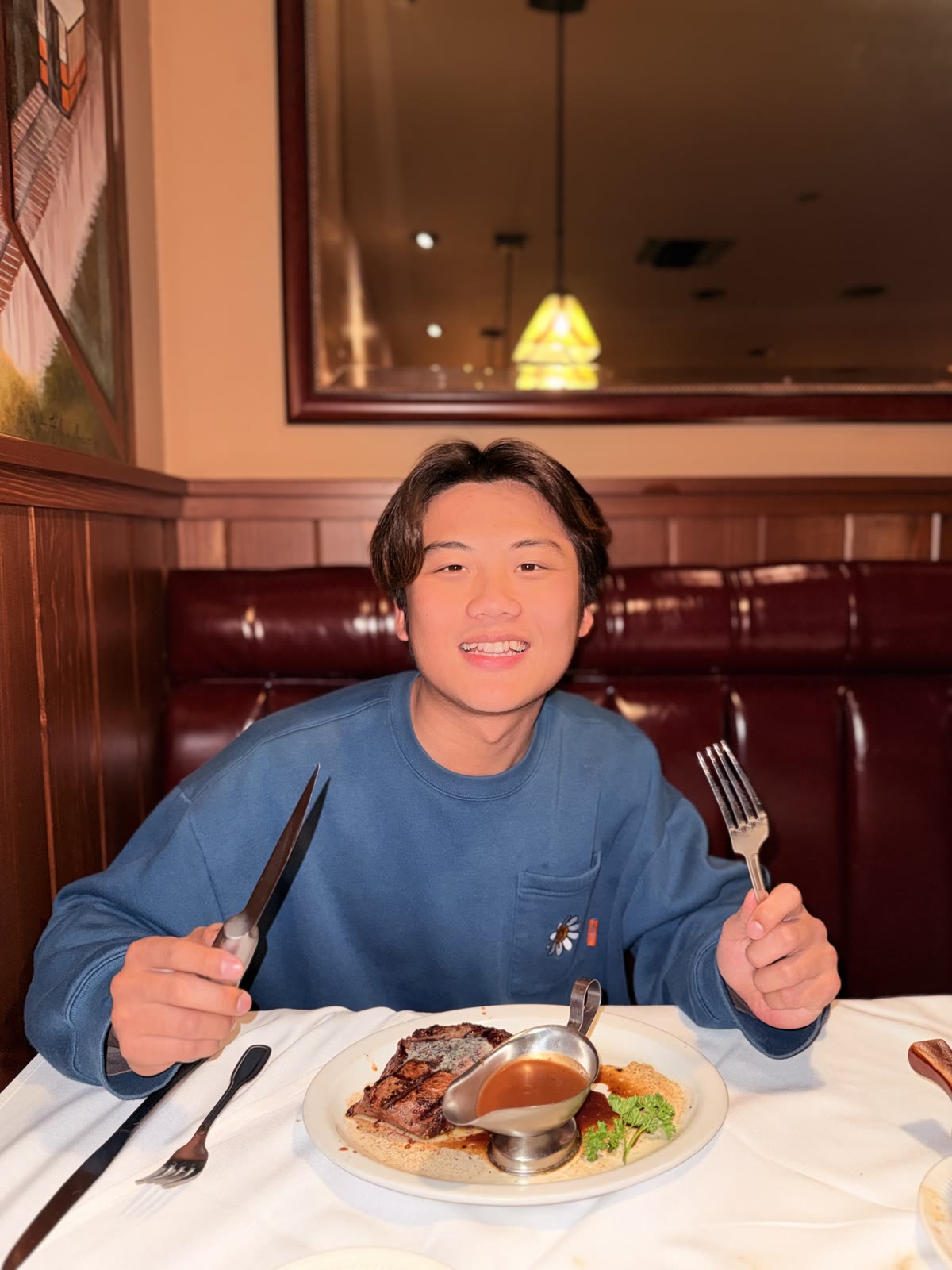 Tsung-Yuan Lin enjoying a steak dinner during his exchange in Philadelphia